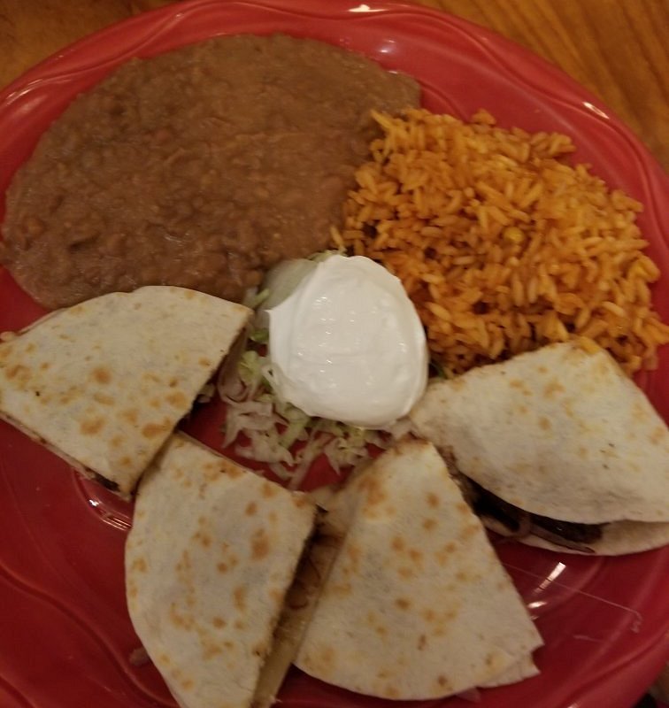 El Gato Negro Mexican Restaurant signature dishes Chicken Tenderloin QuesadillaBlack Angus Ground Chuck QuesadillaQueso Fundido